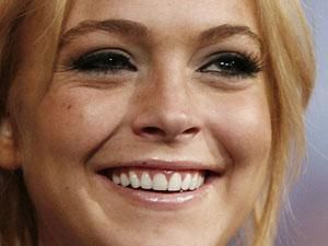 Лохан носитиме браслет, що фіксує вміст спиртного в організмі Лохан носитиме браслет, що фіксує вміст спиртного в організмі