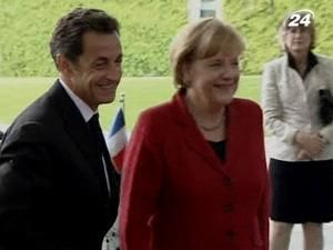 Меркель і Саркозі закликали ввести новий податок на банки Меркель і Саркозі закликали ввести новий податок на банки