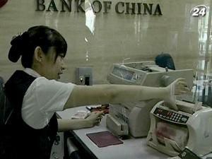 Китай заохочує використання юаня за межами країни