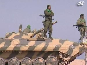 У Лівії триває протистояння прихильників та противників Муамара Каддафі У Лівії триває протистояння прихильників та противників Муамара Каддафі