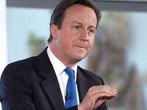 Британский премьер ждет от Каддафи действий Британский премьер ждет от Каддафи действий