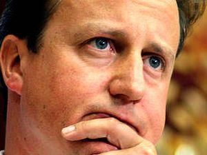 Премьер Великобритании считает, что сторонники Каддафи деморализованы 