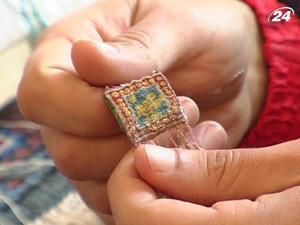 В Днепропетровске соткали самый маленький ковер В Днепропетровске соткали самый маленький ковер