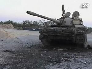 Самолеты НАТО разбомбили склады Каддафи возле города Зинтан Самолеты НАТО разбомбили склады Каддафи возле города Зинтан