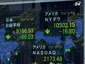 Банк Японии оставил учетную ставку на уровне 0-0,1% 