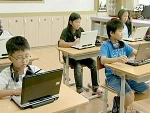 У Південній Кореї паперові посібники замінять ноутбуками і планшетками