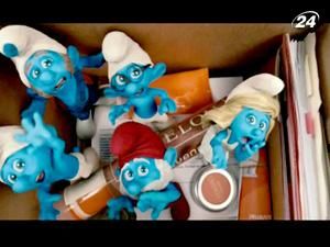 "Ковбои против пришельцев" и "Смурфики" заработали за выходные $36 млн. "Ковбои против пришельцев" и "Смурфики" заработали за выходные $36 млн.