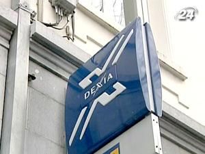Франция и Бельгия пообещали поддержать банк Dexia