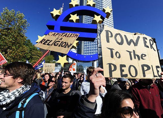 Меркель з розумінням ставиться до акцій проти "фінансового тероризму" в Німеччині Меркель з розумінням ставиться до акцій проти "фінансового тероризму" в Німеччині