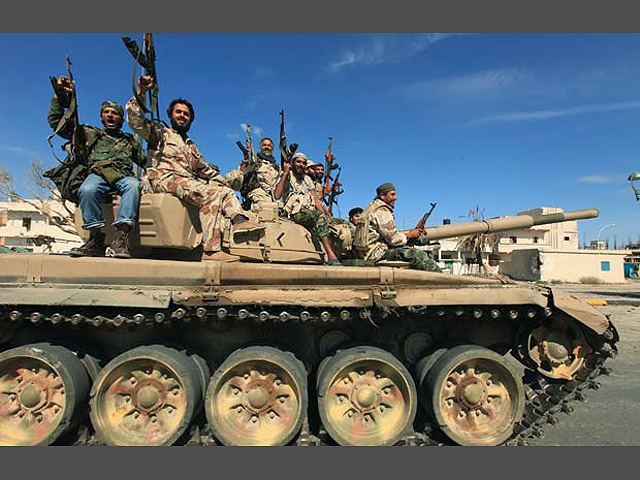 У Лівії святкують загибель Муамара Каддафі У Лівії святкують загибель Муамара Каддафі