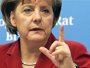 Меркель: Для порятунку Греції приватний сектор має пожертвувати своїм капіталом