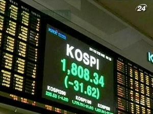 Азійські ринки демонструють падіння на тлі новин про смерть Кім Чен Іра Азійські ринки демонструють падіння на тлі новин про смерть Кім Чен Іра