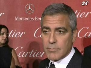 Брэд Питт и Джордж Клуни - первые владельцы статуэток 2012