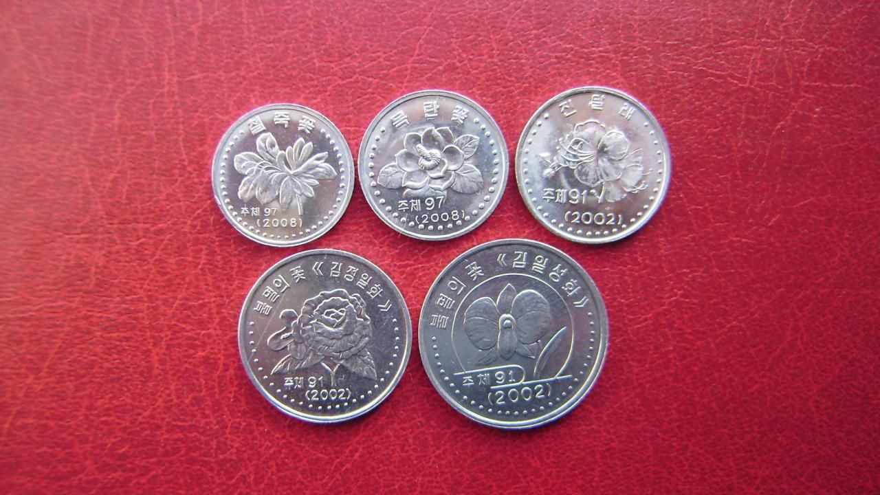 В КНДР полностью запретили использование иностранной валюты В КНДР полностью запретили использование иностранной валюты