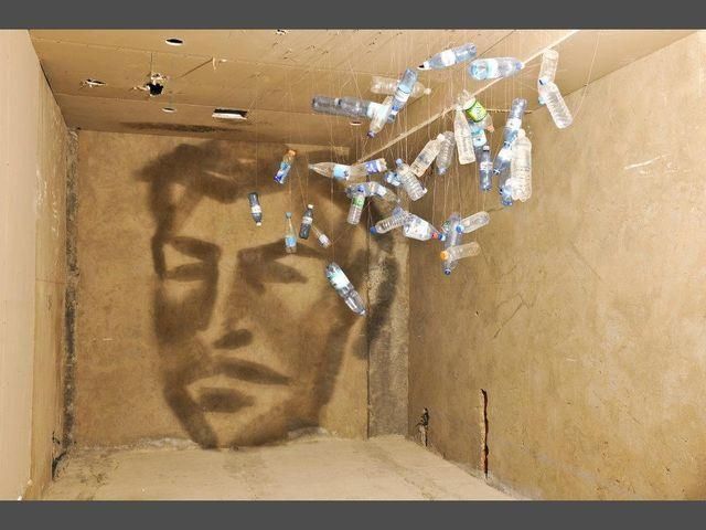 Азербайджанский художник делает рисунки из теней Азербайджанский художник делает рисунки из теней