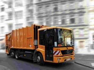 В Киеве мусоровоз наехал на пенсионерку В Киеве мусоровоз наехал на пенсионерку