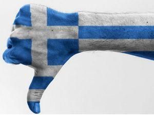 Fitch понизил рейтинг Греции до преддефолтного уровня Fitch понизил рейтинг Греции до преддефолтного уровня