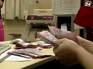 Итог дня: В очереди за дефолтом Украина - вторая после Греции Итог дня: В очереди за дефолтом Украина - вторая после Греции