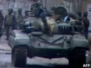 Сирия: Танки обстреливают пригород Дамаска Сирия: Танки обстреливают пригород Дамаска