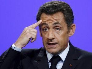 Саркози отрицает, что пытался продать реактор Каддафи