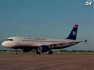 US Airways має намір поглинути American Airlines