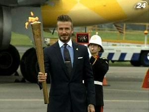 Олимпийский огонь привезли в Великобританию Олимпийский огонь привезли в Великобританию