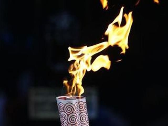  Олімпійський вогонь урочисто передали збірній Україні