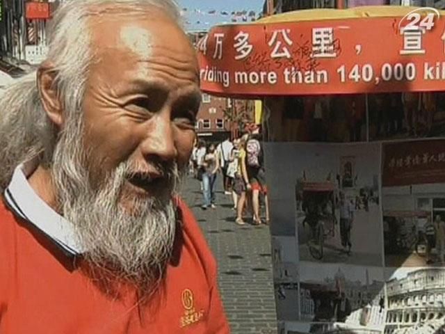 Фермер з Китаю приїхав на Олімпіаду на велосипеді Фермер з Китаю приїхав на Олімпіаду на велосипеді