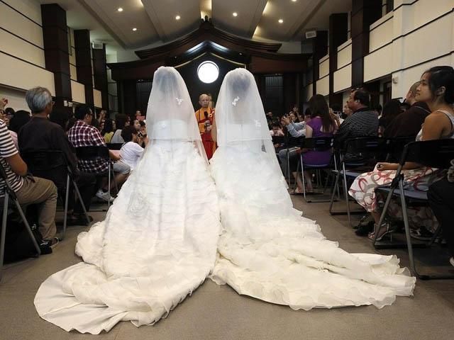 На Тайване прошла первая однополая буддистская свадьба (Фото) На Тайване прошла первая однополая буддистская свадьба (Фото)