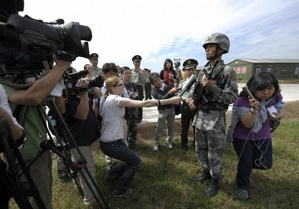Журналисты попросили о защите у властей Китая