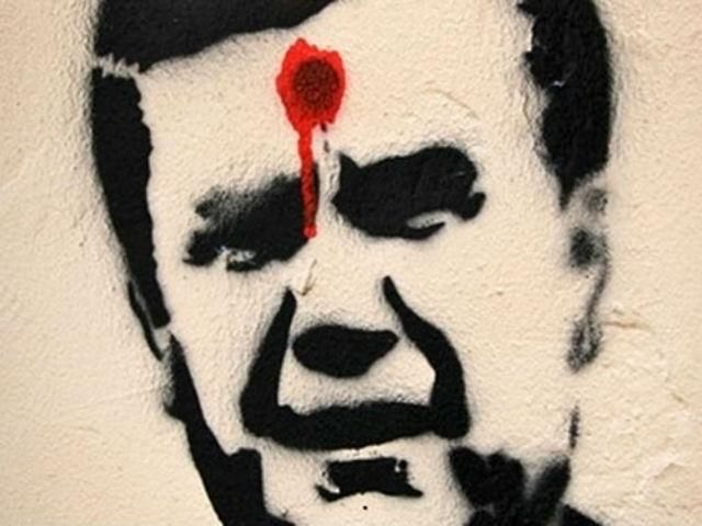 В Сумах посадили активистов, которые рисовали трафареты Януковича с простреленной головой
