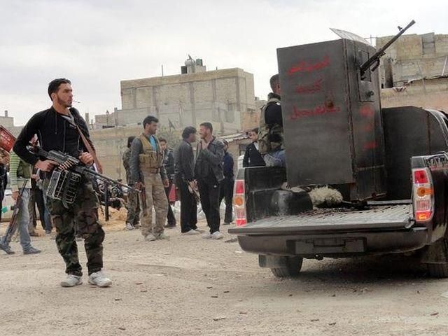 В бою за полицейскую академию в Сирии погибли более 200 военных В бою за полицейскую академию в Сирии погибли более 200 военных