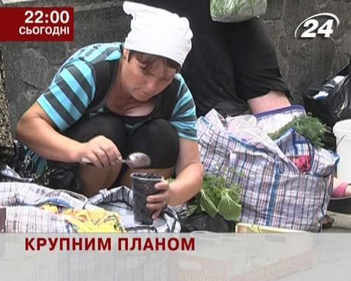 Крупным планом: Кто наживается на стихийной торговле? Крупным планом: Кто наживается на стихийной торговле?