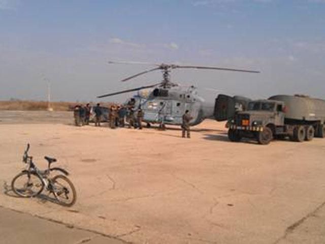 Российские солдаты устанавливают пулеметы вокруг аэродрома в Саках Российские солдаты устанавливают пулеметы вокруг аэродрома в Саках