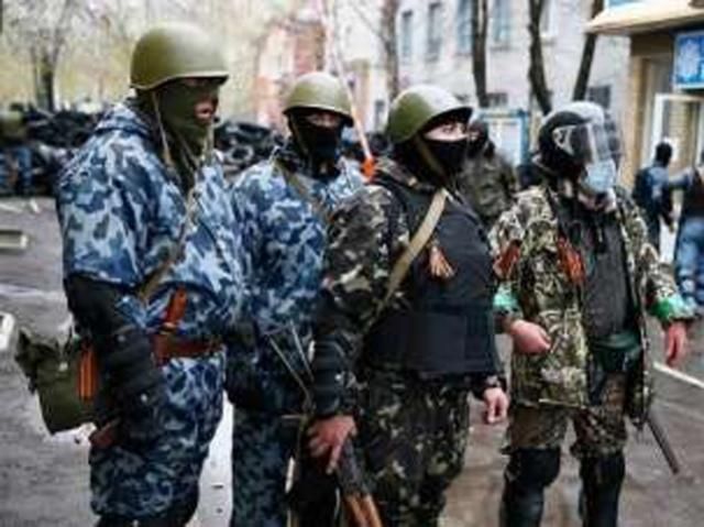 Захватчики в Краматорске хотят за жизнь пленного милиционера оружие
