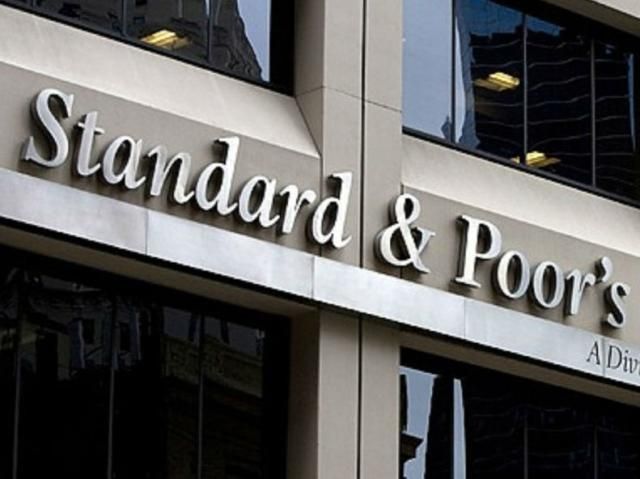 S&P понизило рейтинги "Газпрома" и "Роснефти"