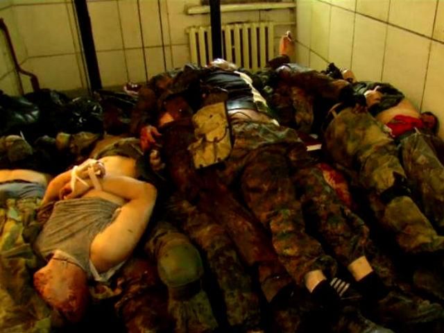 Донецькі морги забиті трупами сепаратистів (Відео 18+)