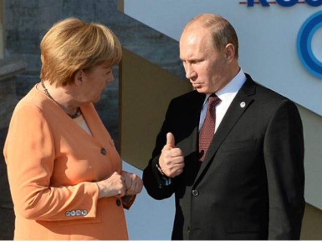 Путін і Меркель розпочали переговори за закритими дверима 