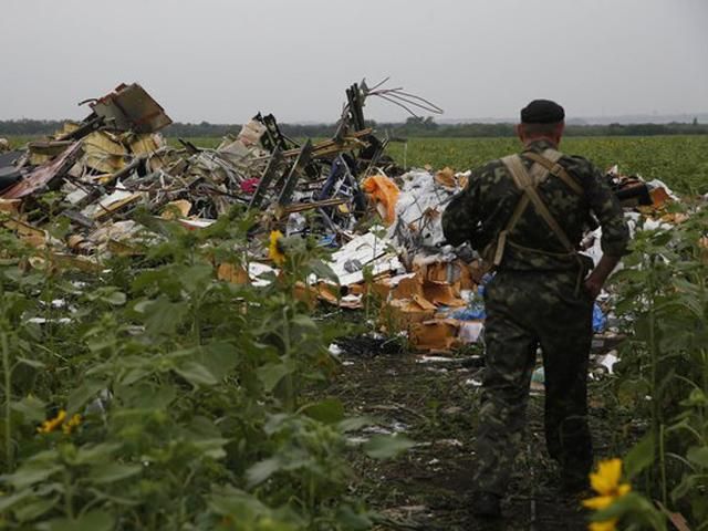 Террористы похитили тела погибших с места авиакатастрофы малайзийского лайнера, — СНБО