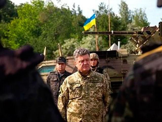 Порошенко доручив припинити бойові дії навколо місця падіння малайзійського Boeing 777