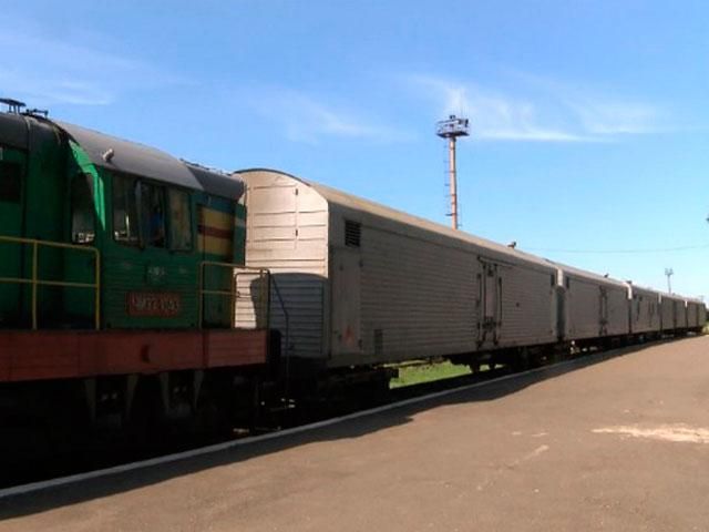 Поезд с телами погибших в авиакатастрофе малайзийского самолета прибыл в Харьков (Фото, Видео)