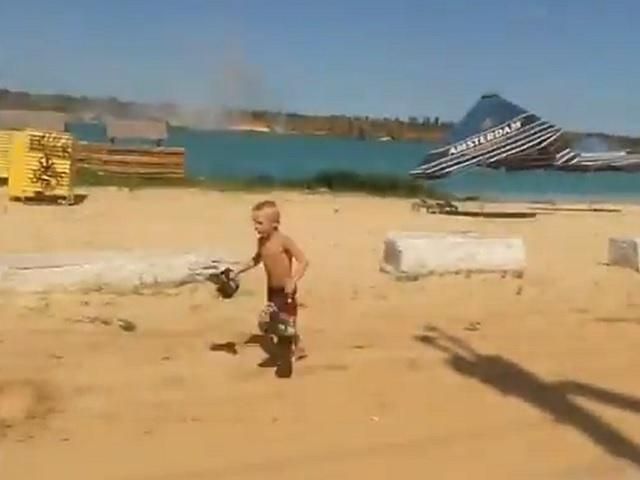 В Авдеевке террористы обстреляли из минометов пляж с отдыхающими (Видео)