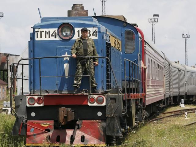 Террористы удерживают поезд с вещами погибших из Boeing-777 Террористы удерживают поезд с вещами погибших из Boeing-777