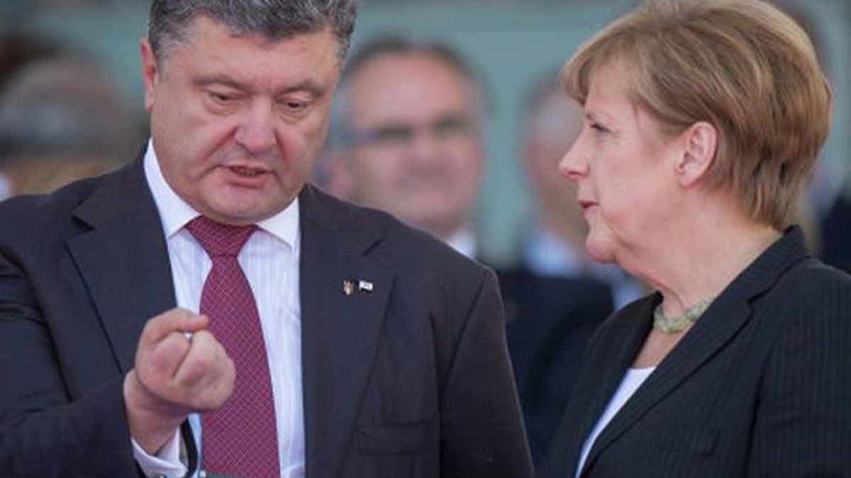 Меркель поддерживает мирные инициативы Порошенко Меркель поддерживает мирные инициативы Порошенко
