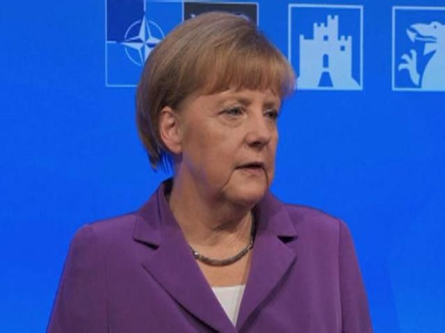 Если огонь прекратится, санкций можно будет избежать, — Меркель