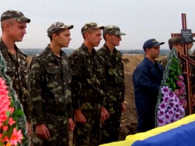 У Дніпропетровську поховали 11 невідомих українських бійців (Відео)