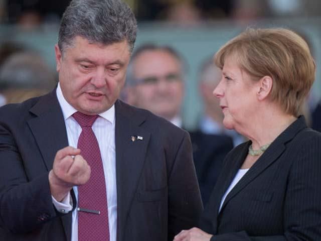 Порошенко обсудил с Меркель нарушения российскими наемниками перемирия на Донбассе