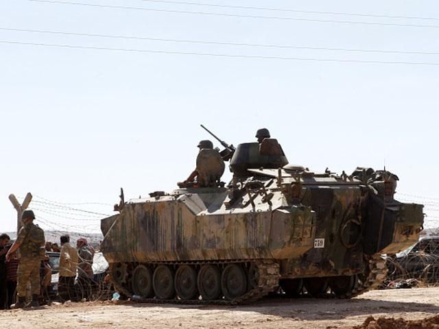 Авиаудары коалиции сдержали наступление ИГ на сирийский город Кобани Авиаудары коалиции сдержали наступление ИГ на сирийский город Кобани