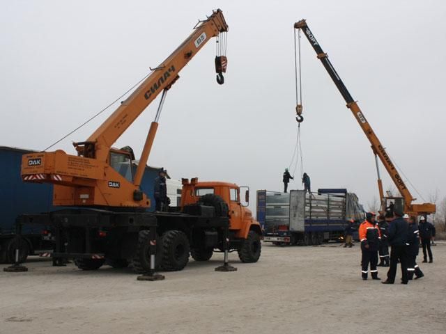 Переселенцев поселят в переносные дома (Фото) Переселенцев поселят в переносные дома (Фото)