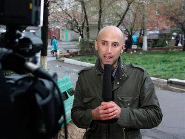 Журналіст RT Грем Філліпс отримав поранення в зоні АТО (Фото) Журналіст RT Грем Філліпс отримав поранення в зоні АТО (Фото)